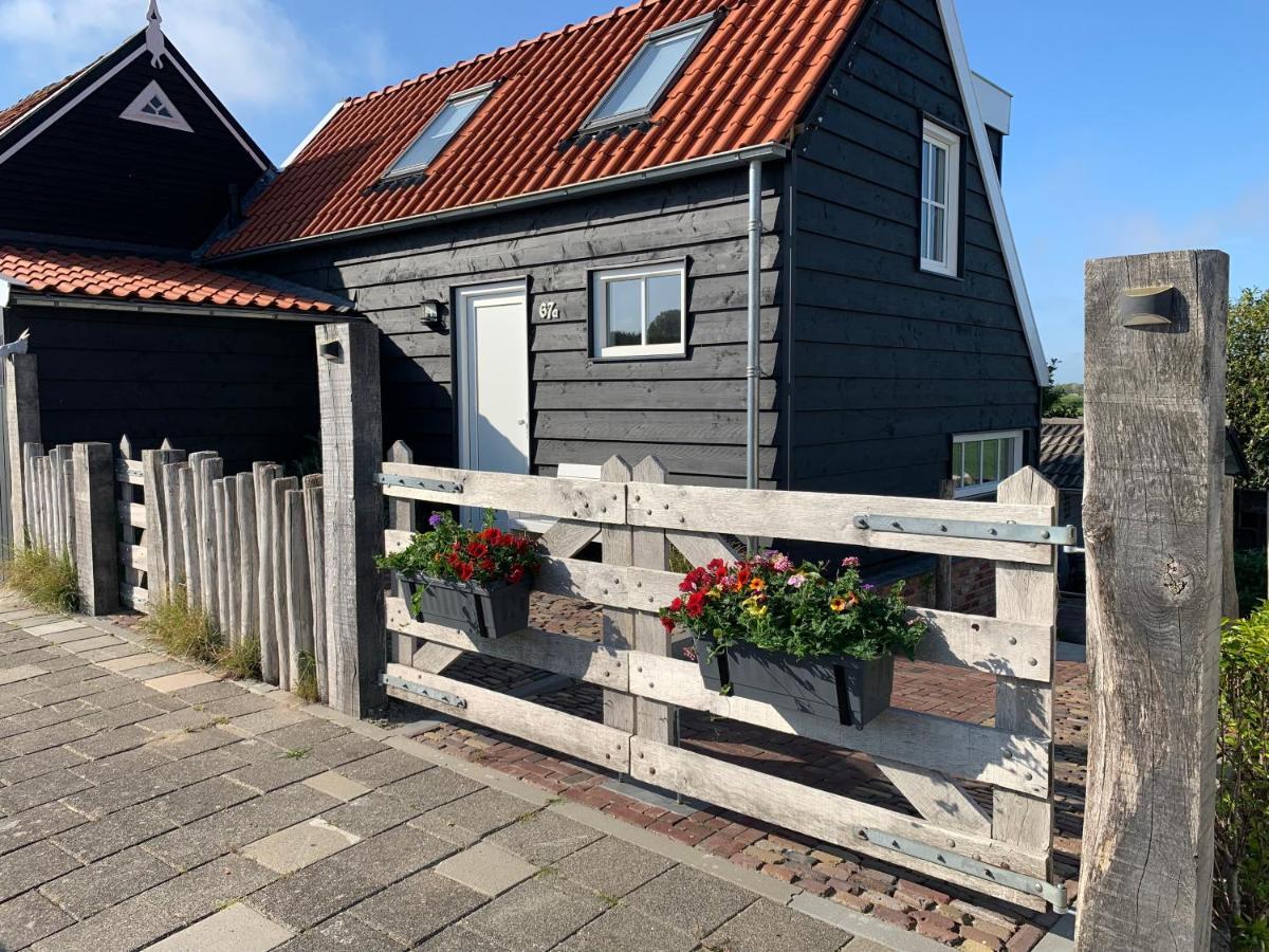 Dijkhofje, dichtbij strand, zee en meer. Vrouwenpolder Buitenkant foto